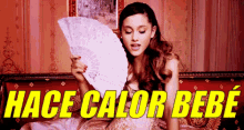 Ariana Grande Cantando Y Agitando Su Abanico GIF - Abanico Calor Ariana Grande GIFs