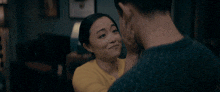 a woman touches a man 's face with the words dream of hot men written below her
