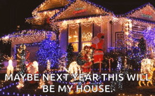 a house decorated with christmas lights and decorations with a caption that says `` maybe next year this will be my house '' .