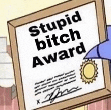 a picture of a cartoon character holding a stupid bitch award .