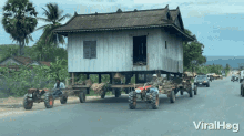 Moving A House Using A Tractors Viralhog GIF - Moving A House Using A Tractors Viralhog Moving A House On Tractors GIFs