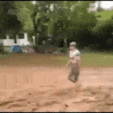 Lurking Mud Man GIF - Lurking Mud Man Pounce GIFs