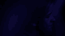 a woman singing into a microphone while a man plays a guitar in the background