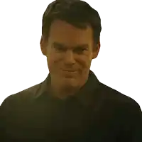 a man wearing a black shirt is smiling with a white background