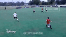 a group of soccer players are playing a game on a disney channel channel