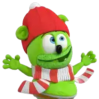 a green gummy bear wears a red hat and scarf