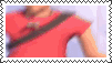 a stamp with a picture of a man in a red shirt and a black belt .