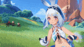 a girl with bunny ears is standing in a grassy field