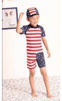 a young boy in an american flag swimsuit and hat