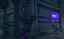 a purple robot is standing in front of a purple screen that says ' a ' on it