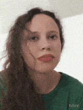 a close up of a woman 's face with the name yulizie on the bottom right