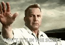 a man in a white shirt is waving his hand and says `` don 't it 's in the script '' .