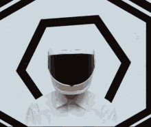 a man wearing a white shirt and a helmet is surrounded by geometric shapes