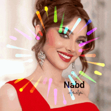 a woman in a red dress is surrounded by colorful lights and the name nabd is on the bottom right