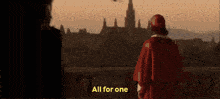 a man in a red cape is standing in front of a city with the words all for one written in yellow