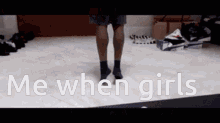 a person is standing on a tiled floor with the words me when girls written on it