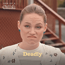 a woman making a funny face with the word deadly behind her
