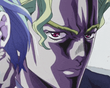 a close up of a man 's face with purple eyes