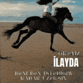 a poster of a woman riding a horse on a beach with the word ilayda on the bottom