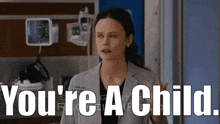 a woman in a lab coat with the words you 're a child above her