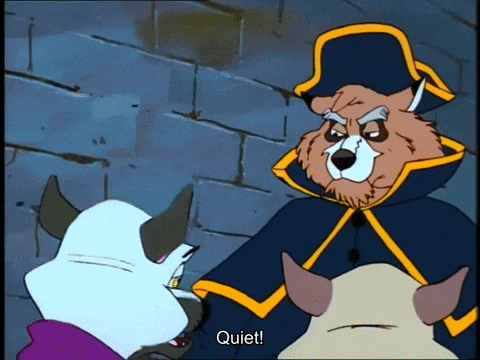 The workhouse master tells the cats to be quiet, and slaps them