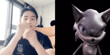 a man is making a funny face next to a cartoon cat .