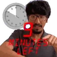 a man with glasses is pointing at a clock that says minutes left