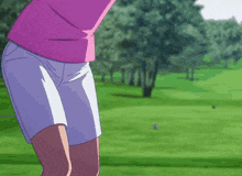a woman in a pink shirt and white shorts is playing golf
