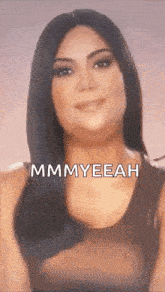 a close up of a woman 's face with the words ' mmmyeeah ' on it .