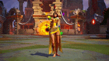 a woman in a yellow dress is standing in front of a castle