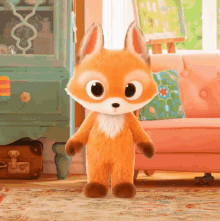 a stuffed fox is standing in front of a pink couch in a living room