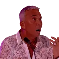 a man speaking into a microphone with his mouth wide open