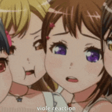 a group of anime girls are standing next to each other and one of them has a viole reaction written on her face .