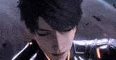 a close up of a man 's face with his eyes closed .