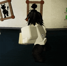 a cartoon character is standing in front of a wall with a shadow of a man on it