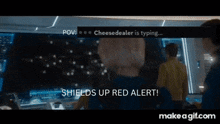 a man in a star trek uniform says " shields up red alert " at the bottom of the screen