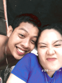 a man and a woman are posing for a picture and the woman 's username is anne071724