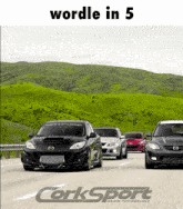 a group of cars are driving down a road and the word corksport is on the bottom