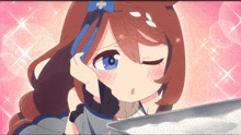 a girl with a blue flower in her hair winks at something