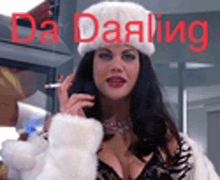 a woman wearing a fur coat and hat is smoking a cigarette