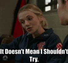 a woman in a fireman 's uniform says it does n't mean i shouldn 't try