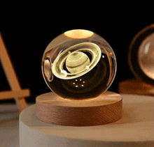 a glass ball with a picture of a planet in it