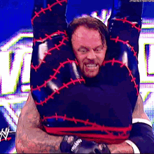 The Undertaker Tombstone Piledriver GIF