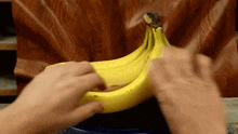 a bunch of bananas are being peeled by someone