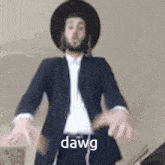 a man in a suit and hat is dancing with his hands outstretched and the words dawg written on the bottom .