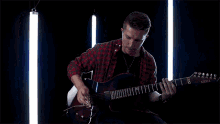 shredding cole rolland weird genius playing guitar musician