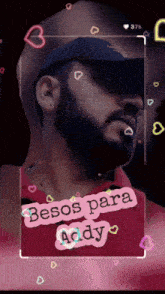 a picture of a man with the words besos para addy above him