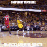 a basketball player is being sniped by michelle during a game