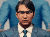 a man wearing glasses and a suit and tie looks at the camera