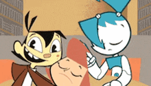 a couple of cartoon characters are sitting next to each other on a table